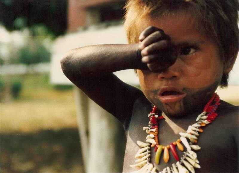 A native girl in Union de
                Choco with skin dyed from water fruit
